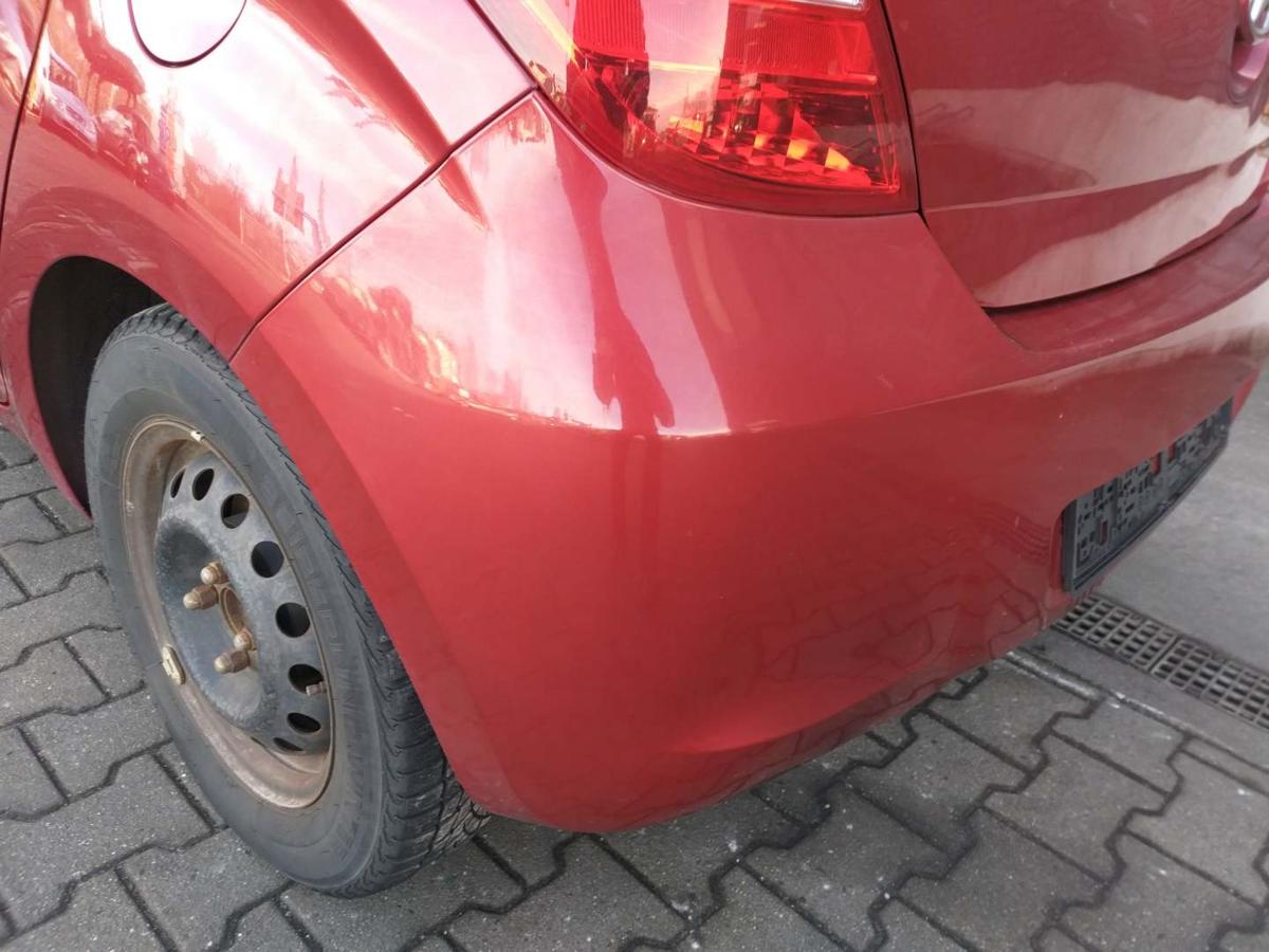 Hyundai I20 PB original Stoßstange Stossfänger hinten Berry Red 1F Bj.2009